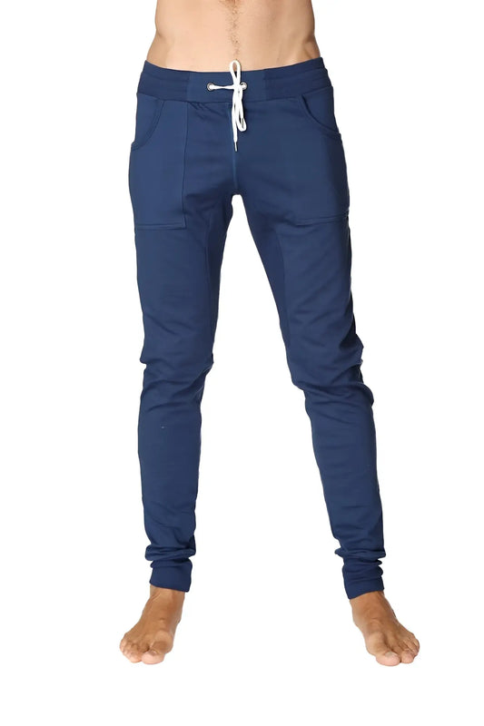 Navy blue long cuffed jogger and yoga sweat pants with white drawstring waistband and elastic cuffs