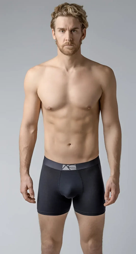 Black menâs long trunks boxer briefs with a dark gray waistband and subtle white logo for comfortable support