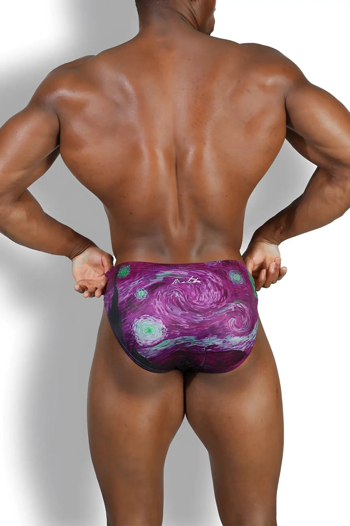 Purple and teal starry night patterned lovesick briefs featuring a spooky night design for stylish comfort