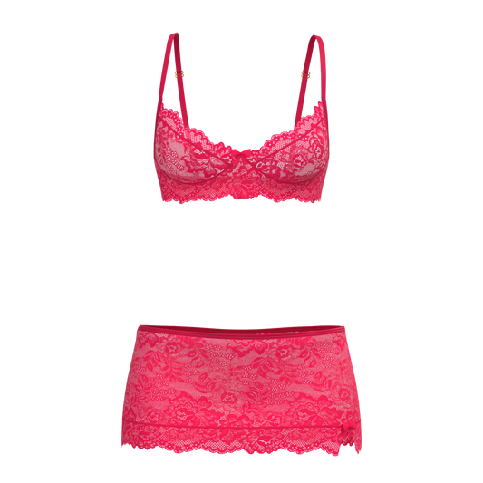 Fuchsia lace magic silk bra skirt and thong set featuring delicate floral lace and matching sheer skirt for elegant lingerie wear