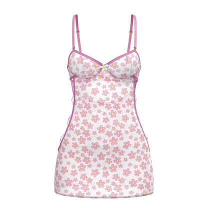 White floral magic silk dress with pink and yellow flowers, thin pink straps, and ruffled hem detail