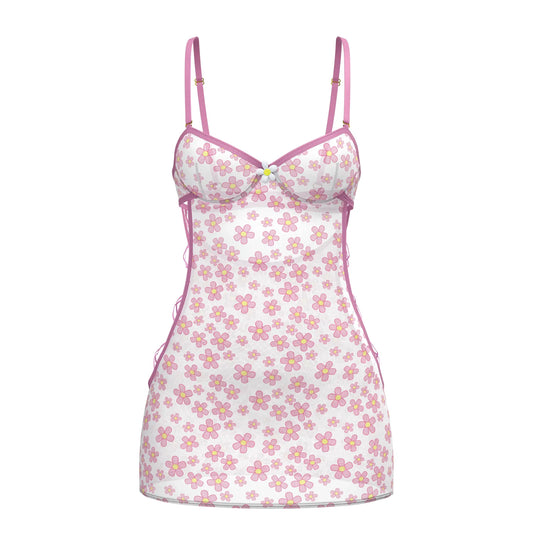 White floral magic silk dress with pink and yellow flowers, thin pink straps, and ruffled hem detail