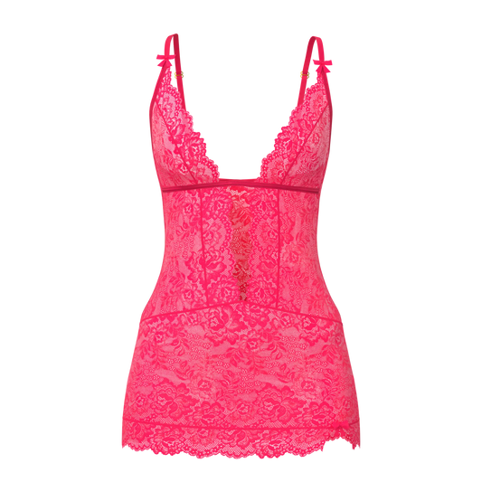 A vibrant pink lace magic silk plunge chemise and g-set with delicate floral patterns and thin shoulder straps
