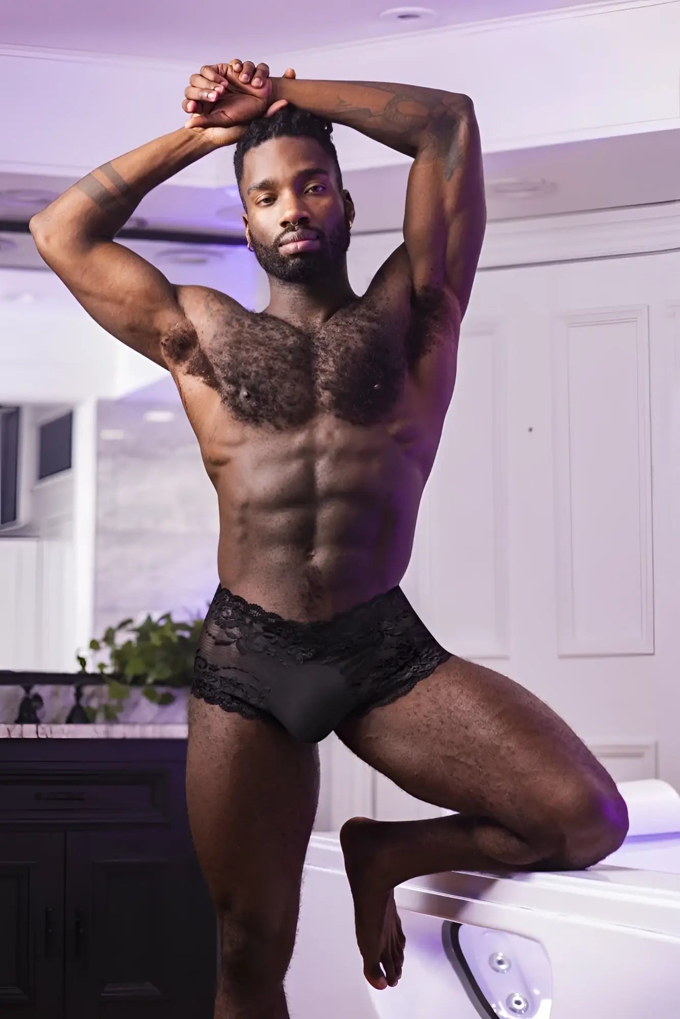 Black lace-trimmed male power 127-280 sassy lace mini short sheer pouch briefs in black front view