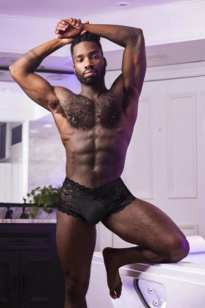 Black lace-trimmed male power 127-280 sassy lace mini short sheer pouch briefs in black front view