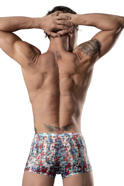The man is wearing male power 131-293 pouch shorts with colorful red white and blue geometric patterns