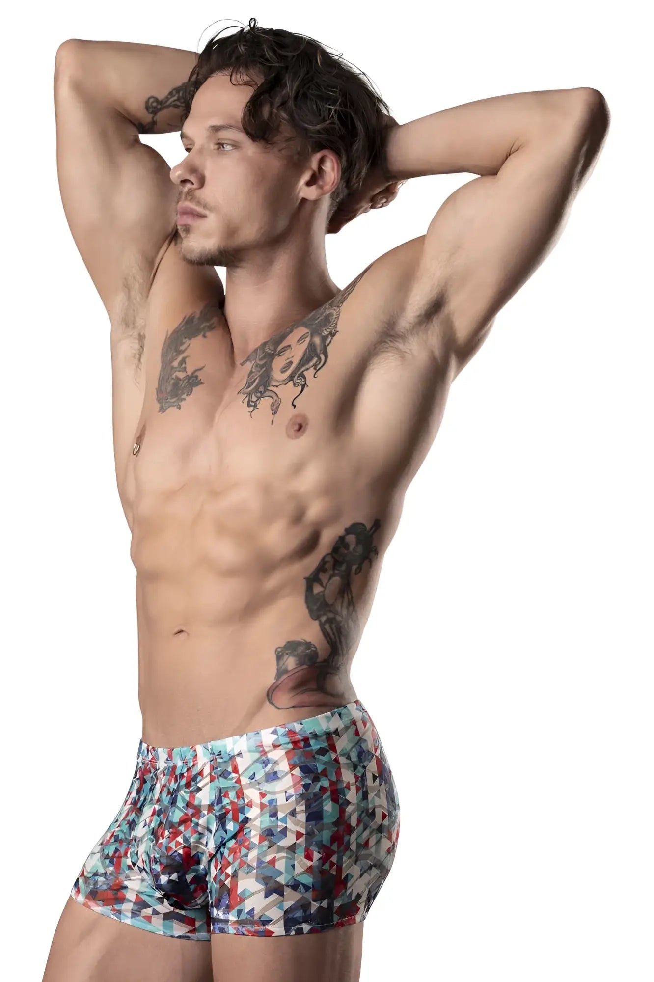 Men’s Male Power 131-293 boxer briefs with vibrant red white and blue geometric pattern and lace pouch detail