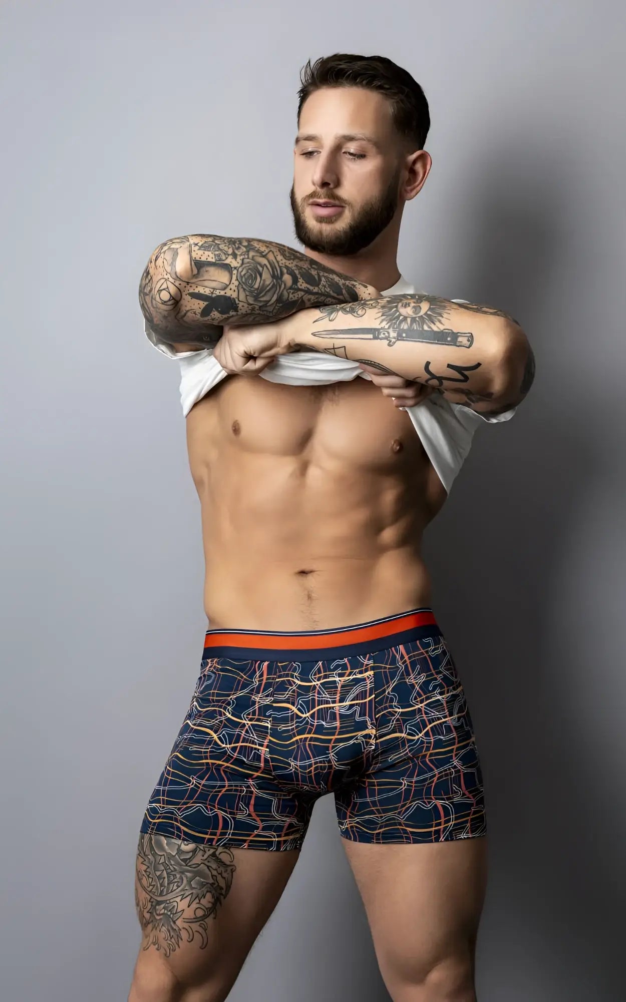 Male power 160-299 soo cumfy boxer brief in navy blue with vibrant orange pink white geometric pattern and orange waistband