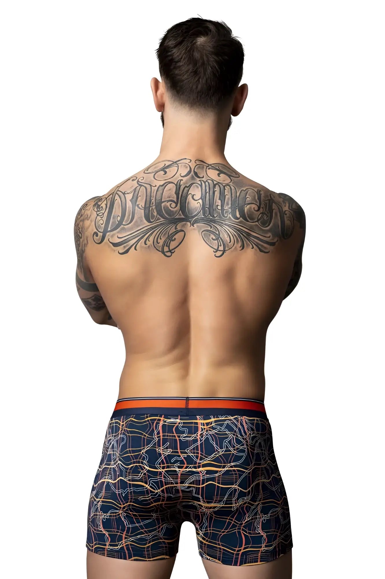 Men’s navy blue boxer briefs with orange and white geometric pattern and orange waistband by male power