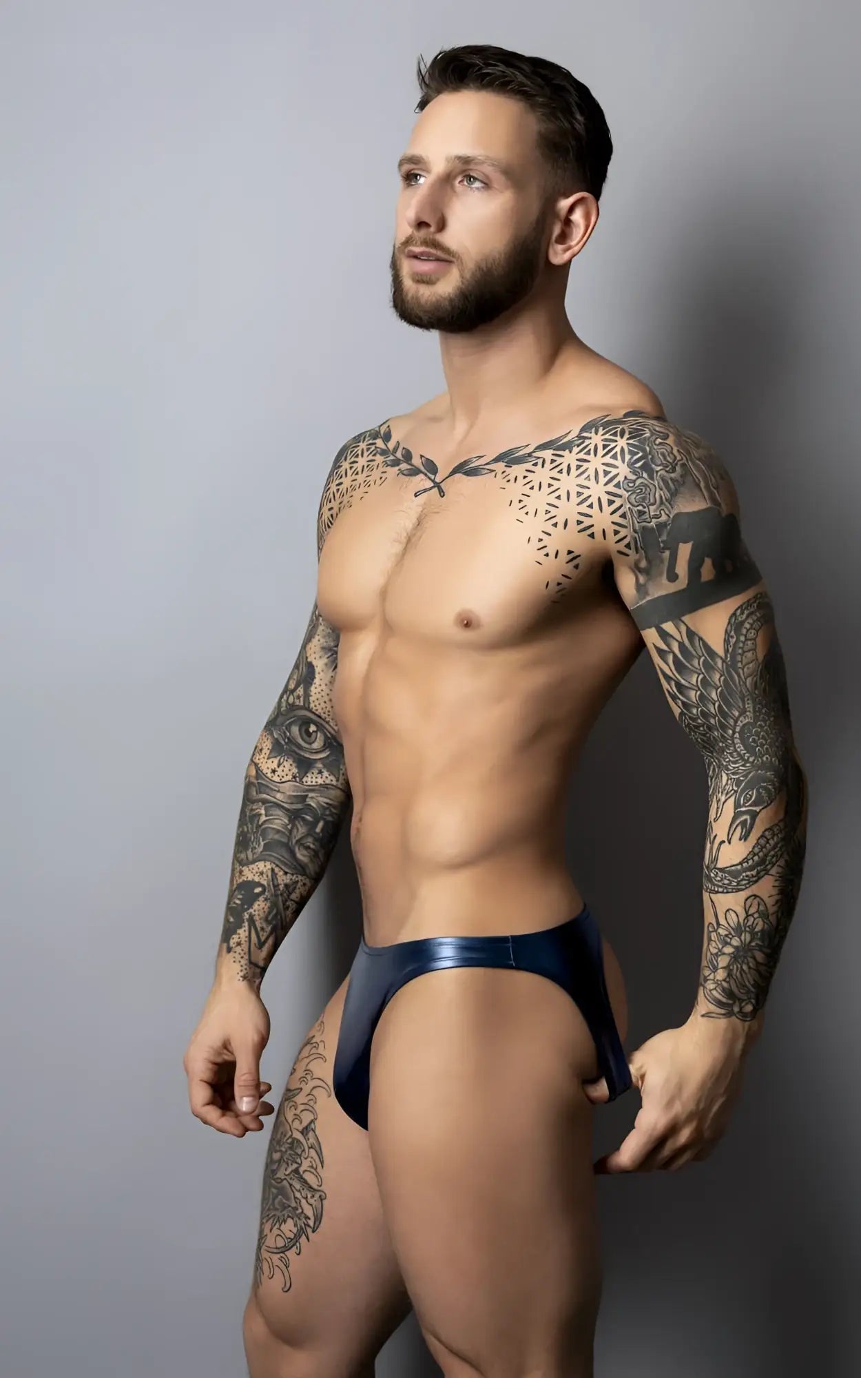 A sleek deep blue metallic brief with a glossy finish and contoured design from Male Power 300-301 liquid onyx 2.0