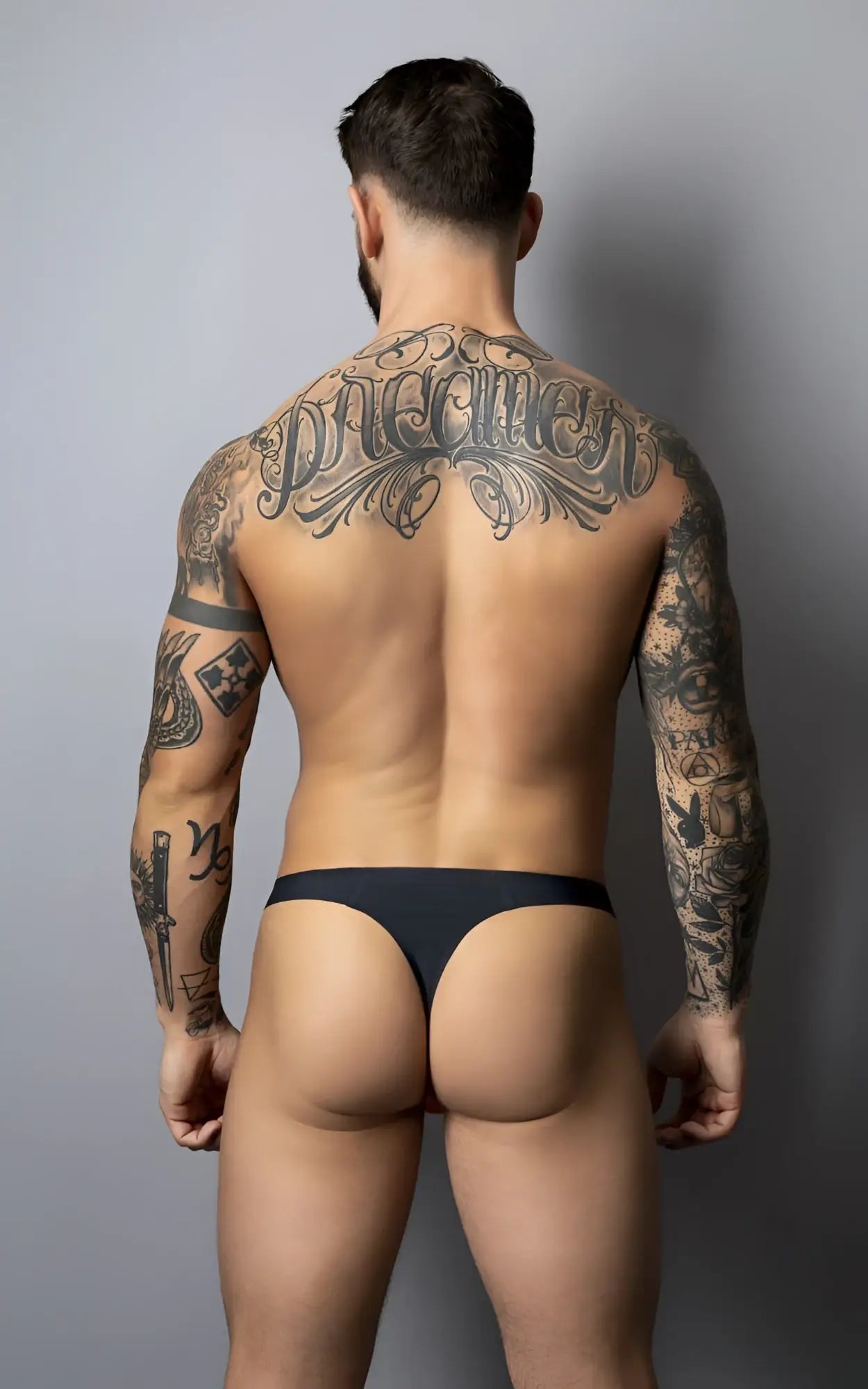 Black-red male power 442-300 hot mesh thong showing the back side with a smooth form-fitting design in mesh material
