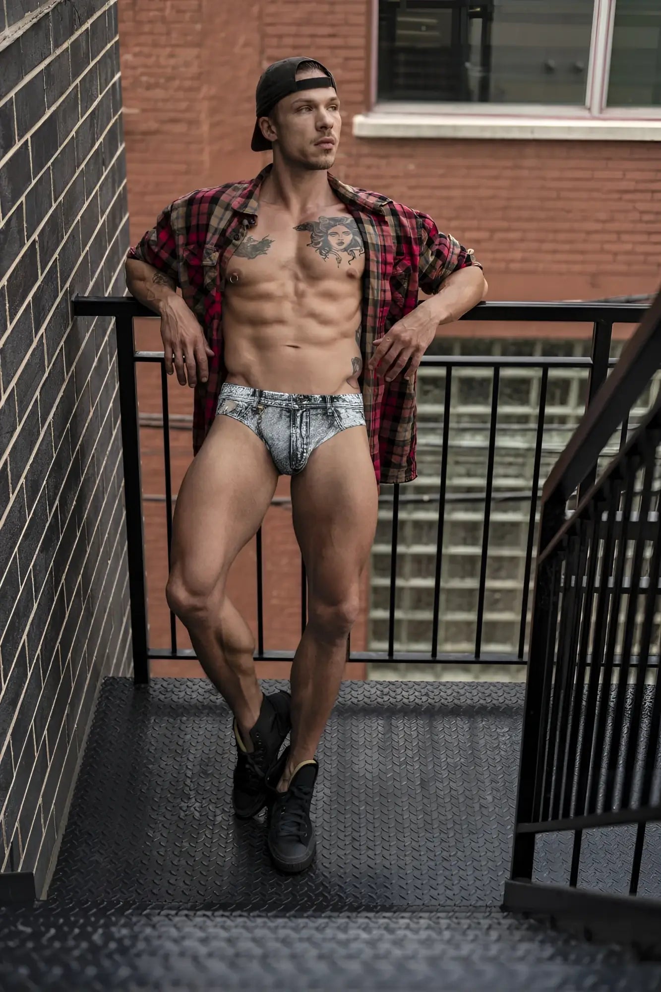 Denim patterned briefs with faded blue and white wash and subtle stitching from male power 486-286 dirty denim bikini
