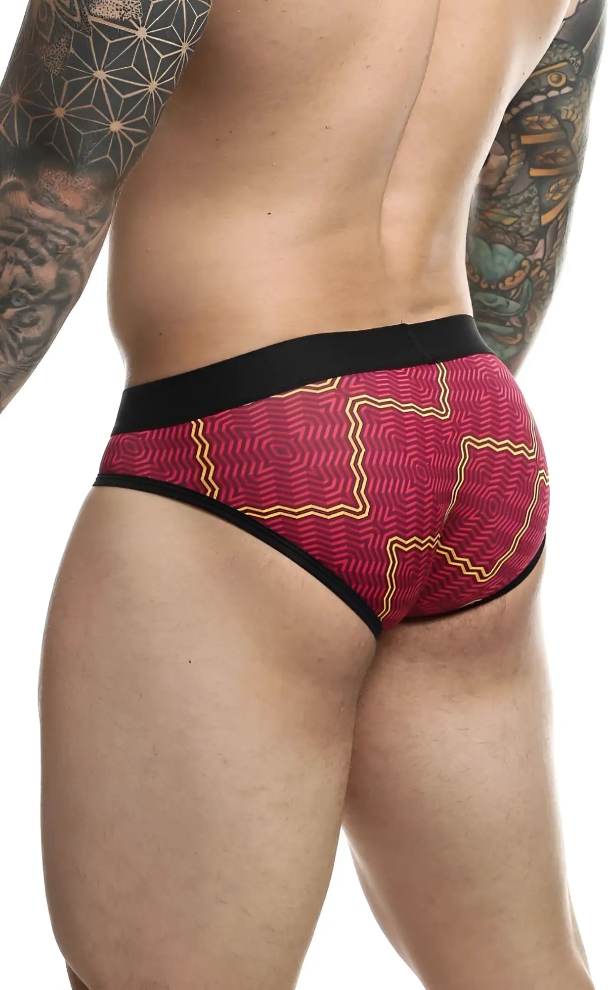 Malebasics brief sexy pouch featuring red and yellow patterned fabric with black trim and a supportive pouch design