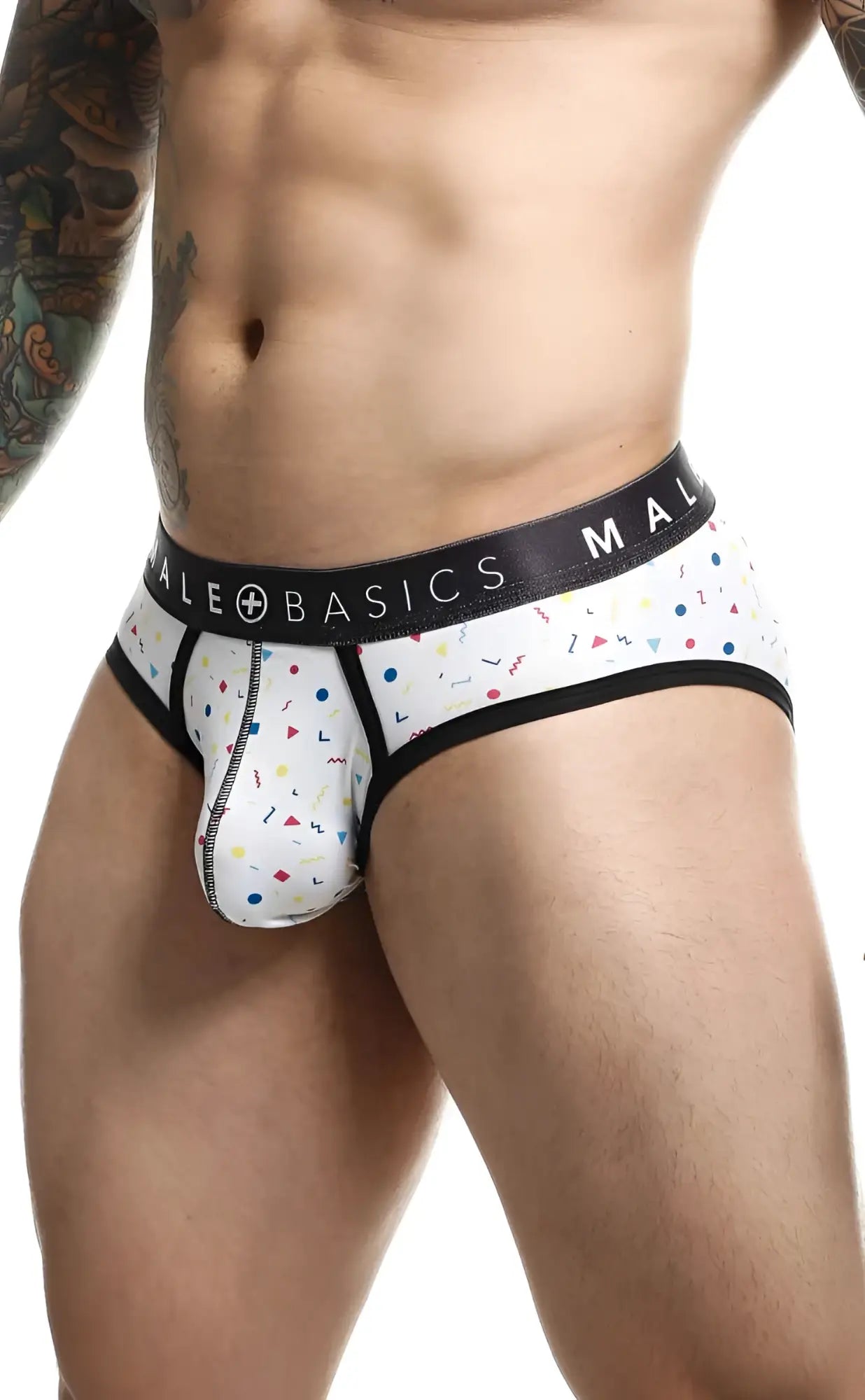 White men’s briefs with colorful confetti pattern black trim and male basics brand on waistband malebasics brief sexy pouch