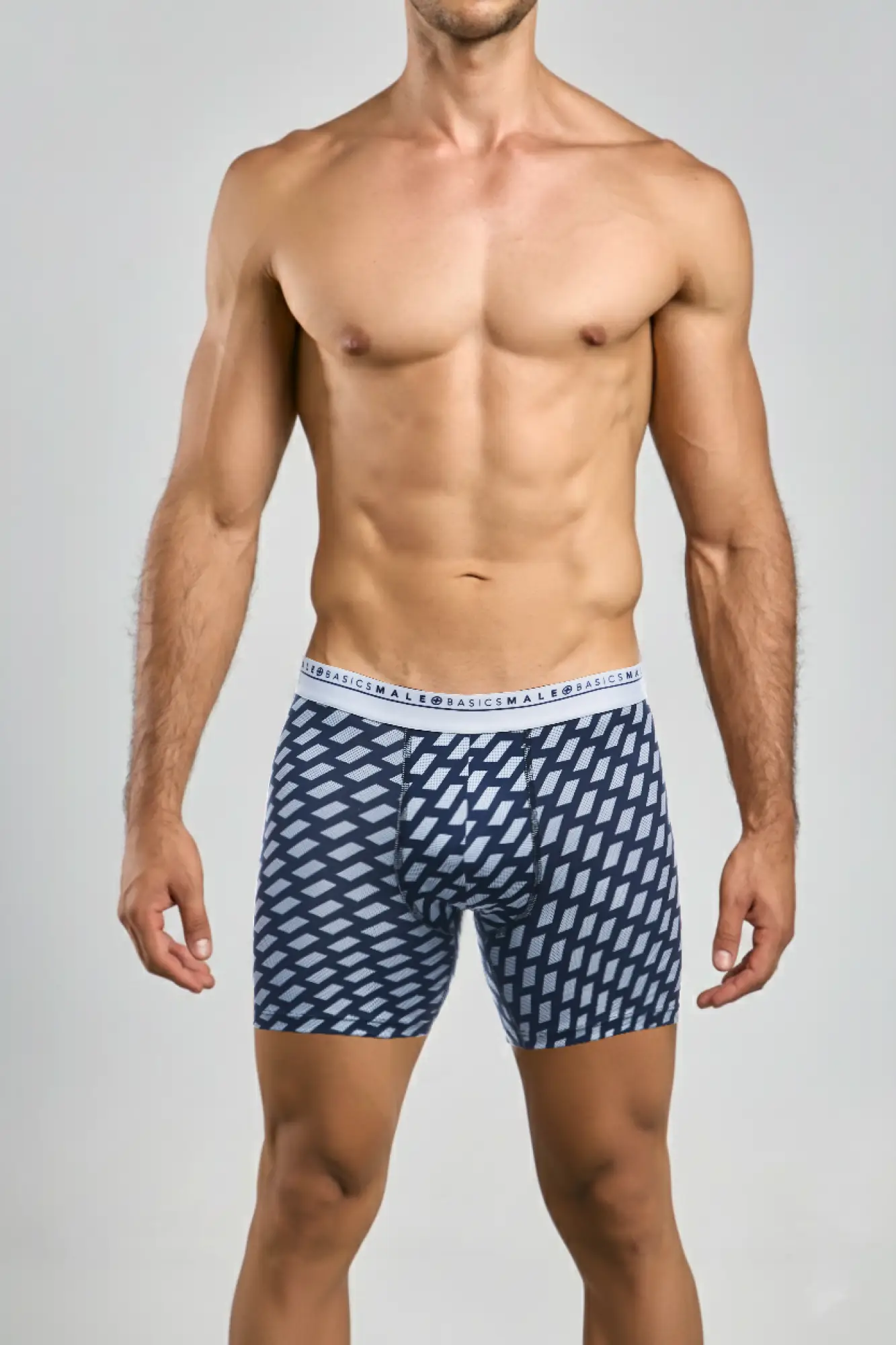 Navy blue malebasics bundle boxerbrief with light gray parallelograms and white waistband featuring basicsmal logo