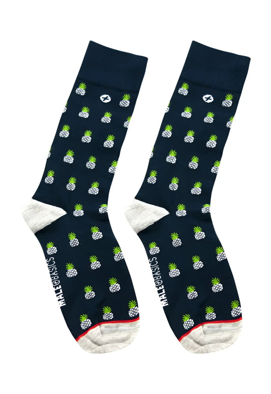 Navy blue male basics fun socks with green and white pineapple pattern and red toe and heel trim