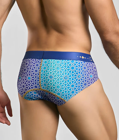 MaleBasics hipster brief in blue and turquoise geometric pattern with gold trim designed for men’s comfort