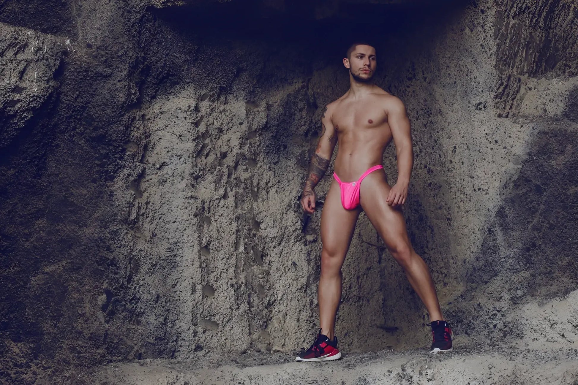 Bright pink malebasics mbl52 y buns thongs swim trunks with low-rise cut and thin side straps front view