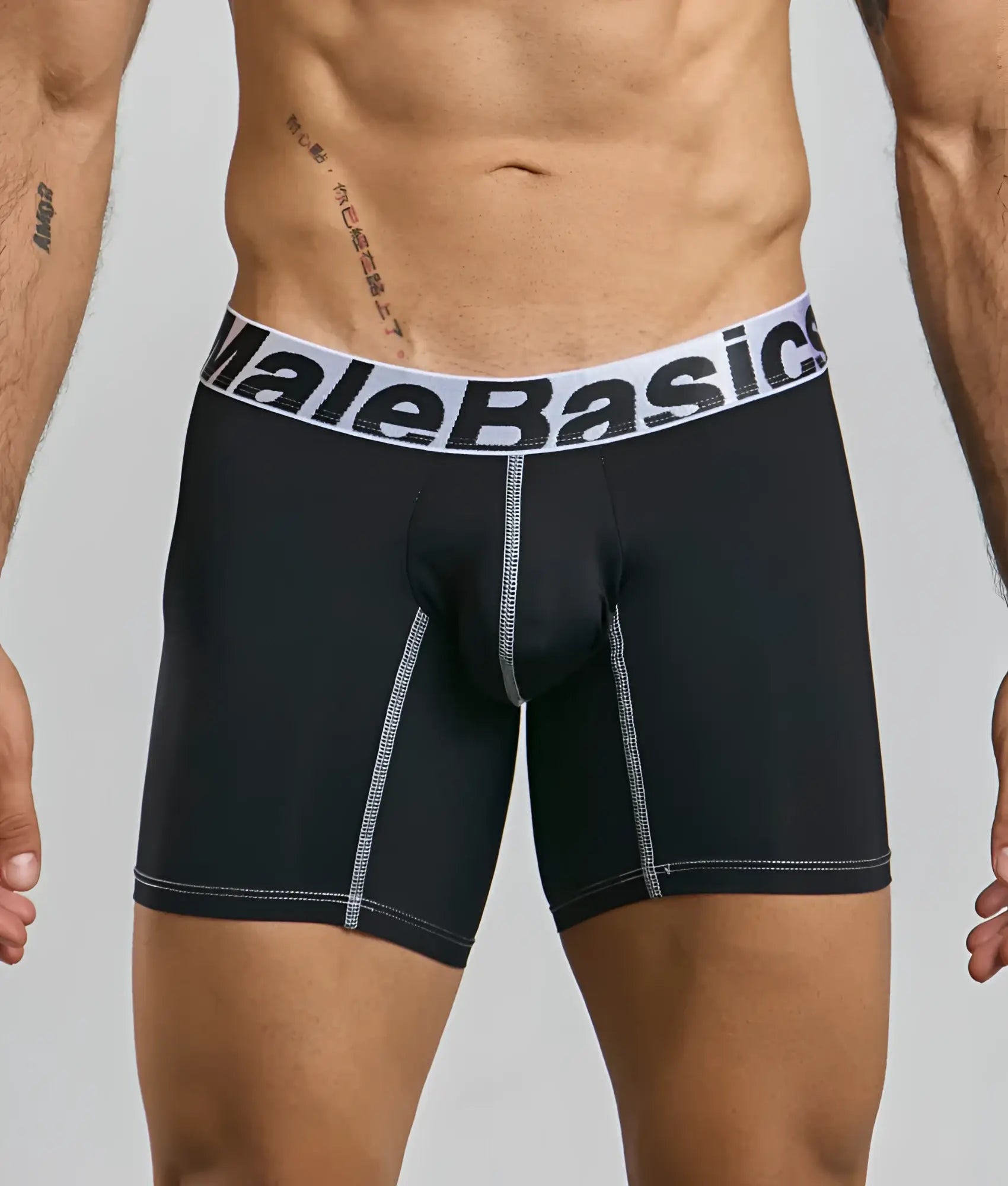 Black malebasics microfiber boxer brief with white elastic waistband and silver stitching shown from the back side