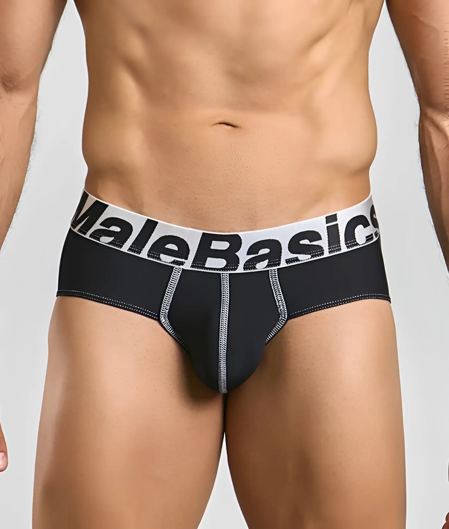 MaleBasics microfiber brief in black with a white waistband featuring bold black lettering and silver stitched seams