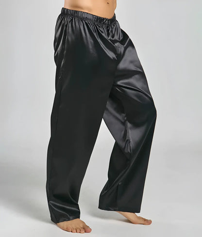 Black satin malebasics pants with elastic waistband and wide legs for comfortable loungewear