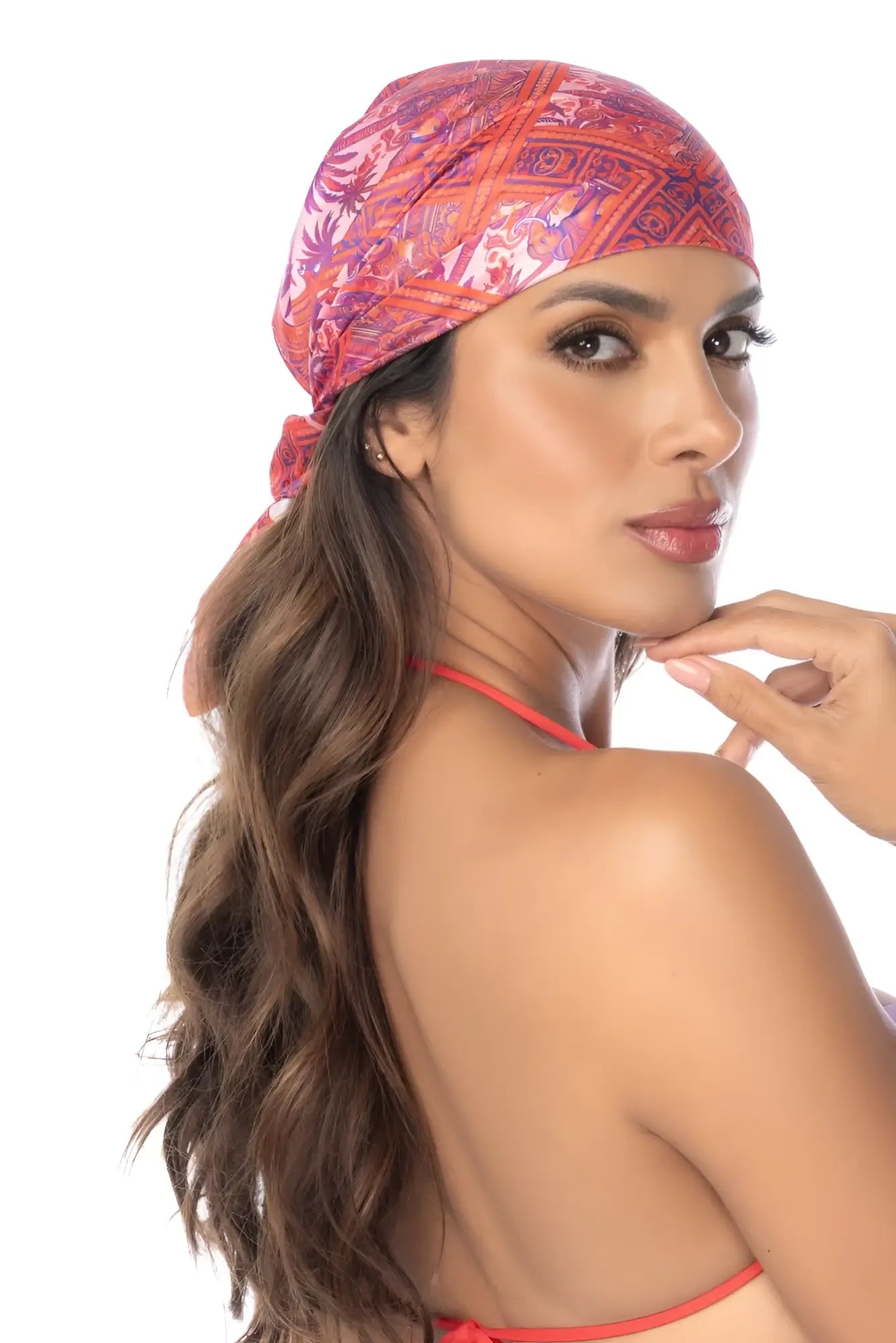 Mapale 47018 all ways scarf in desert mirage features a vibrant pink and purple geometric patterned headscarf wrapped snugly