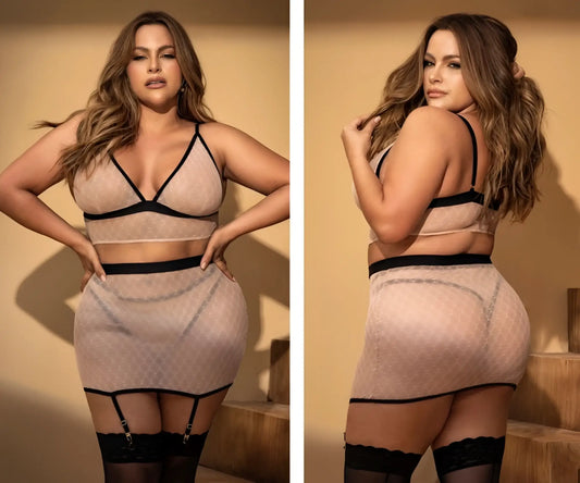 A plus-size woman models a sheer nude and black lace mapale 8776x lingerie set with matching garter belts