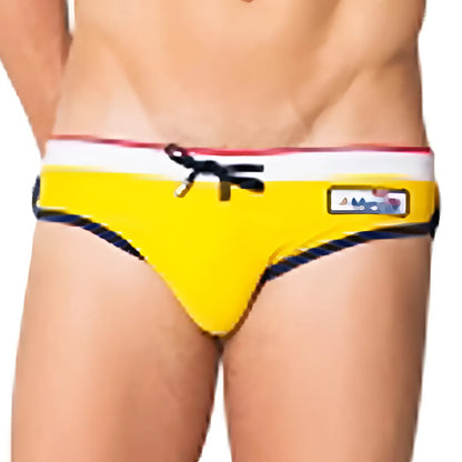 Bright yellow Marcuse MA Cargo23 swim trunks with white waistband red and navy trim and black drawstrings