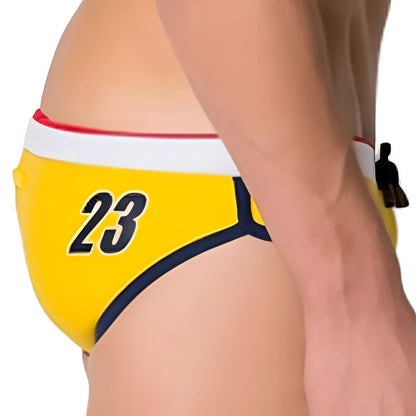 Marcuse MA Cargo23 bright yellow swim trunks with white waistband red trim and bold navy blue 23 lettering