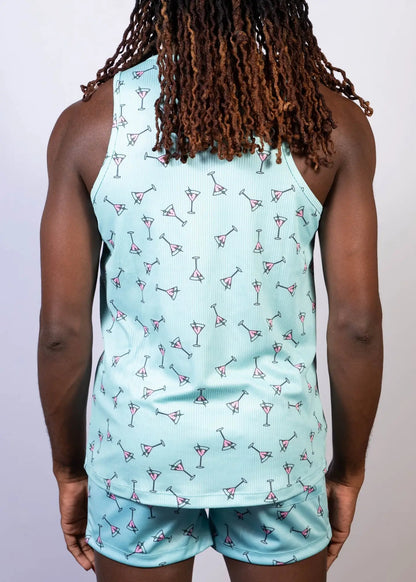 Light blue tank top with a repeating pattern of pink and black martini glasses called martini print tank