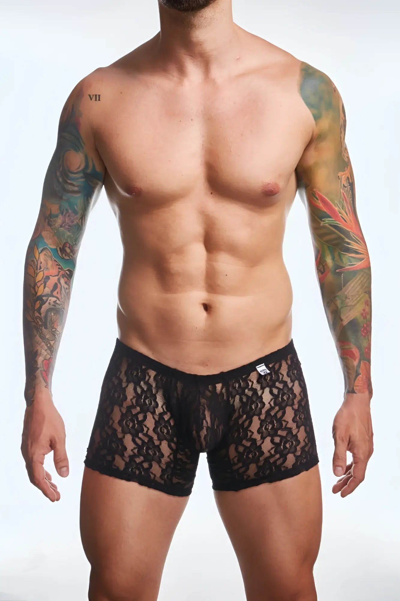 Black floral lace men’s briefs made of lace material for comfortable stylish wear by mob men