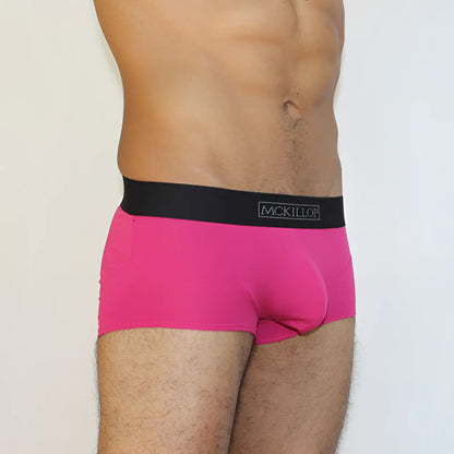 Bright pink mckillop jagger modal boxer brief underwear in size s with black waistband and white brand name lettering