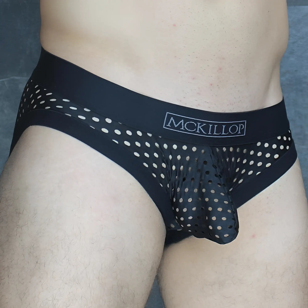 Mckillop MCKOBHQ brief black menâ€™s underwear with sheer perforated mesh and white polka dot design