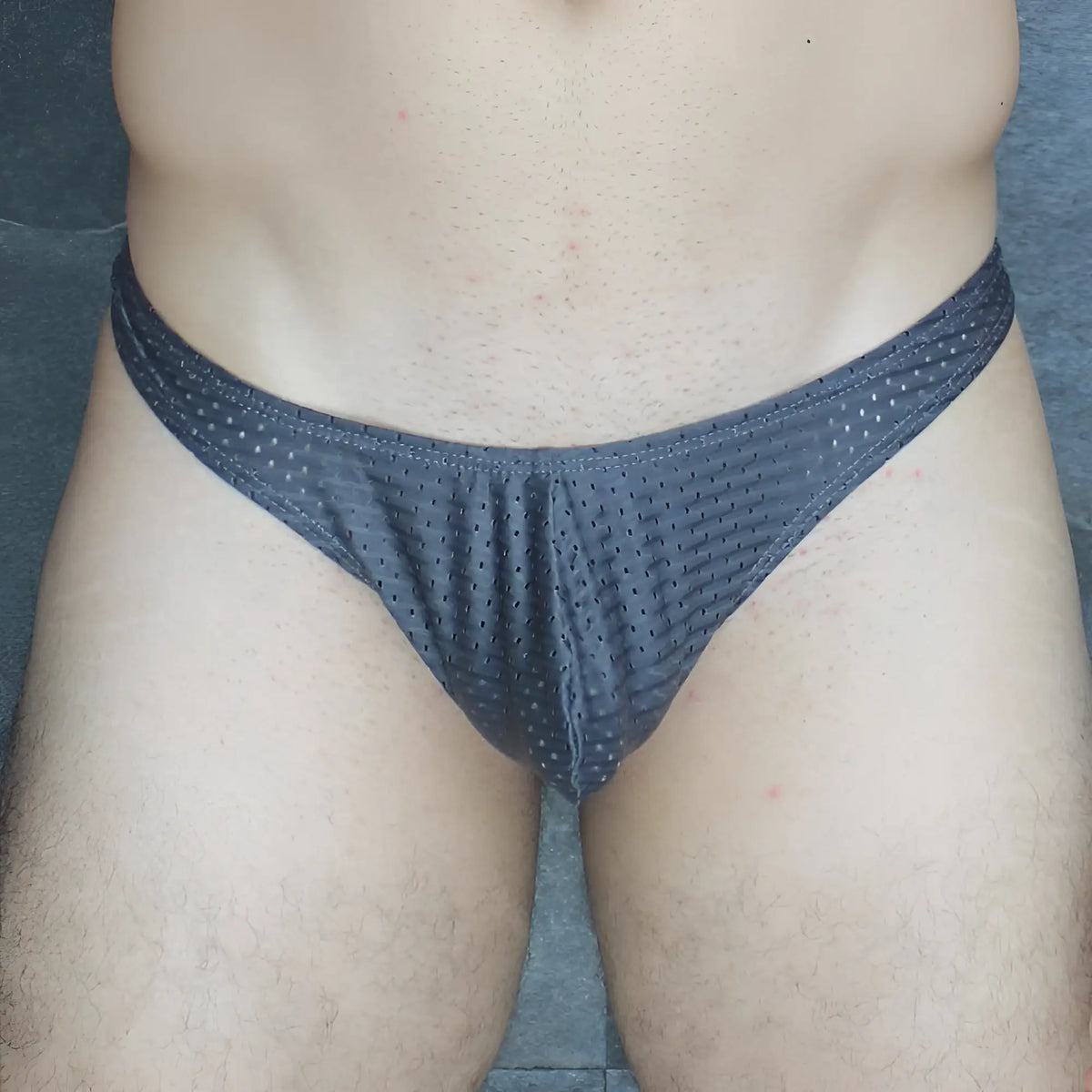 Dark gray mesh briefs with a subtle dotted pattern from mckillop mckvtpl thong collection