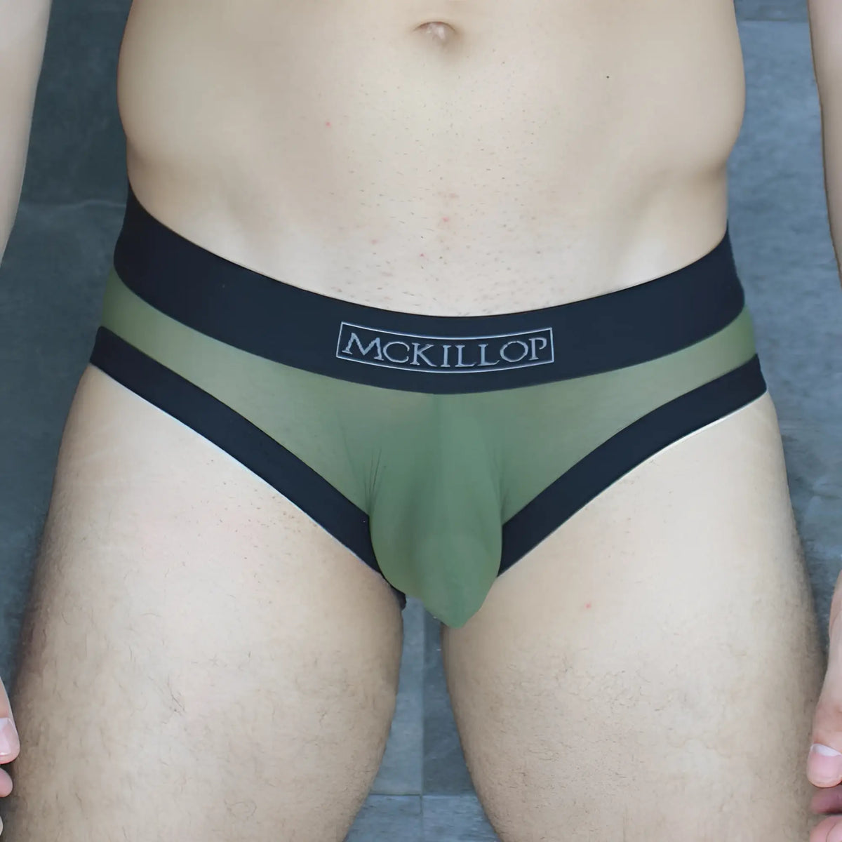 Olive green mckillop obus hoist brief ultra mesh with black trim and contrasting waistband in breathable fabric