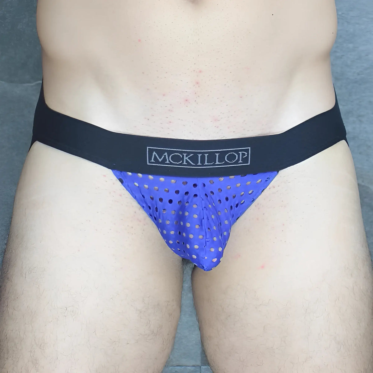 Blue perforated mesh briefs with black mckillop waistband in lycra for active support and comfort