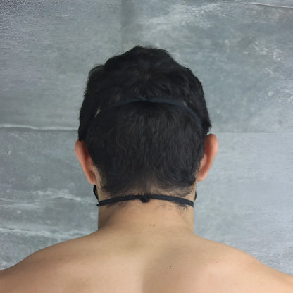 Back view of mckillop polypropylene unisex yellow face mask with black elastic headband one size fit