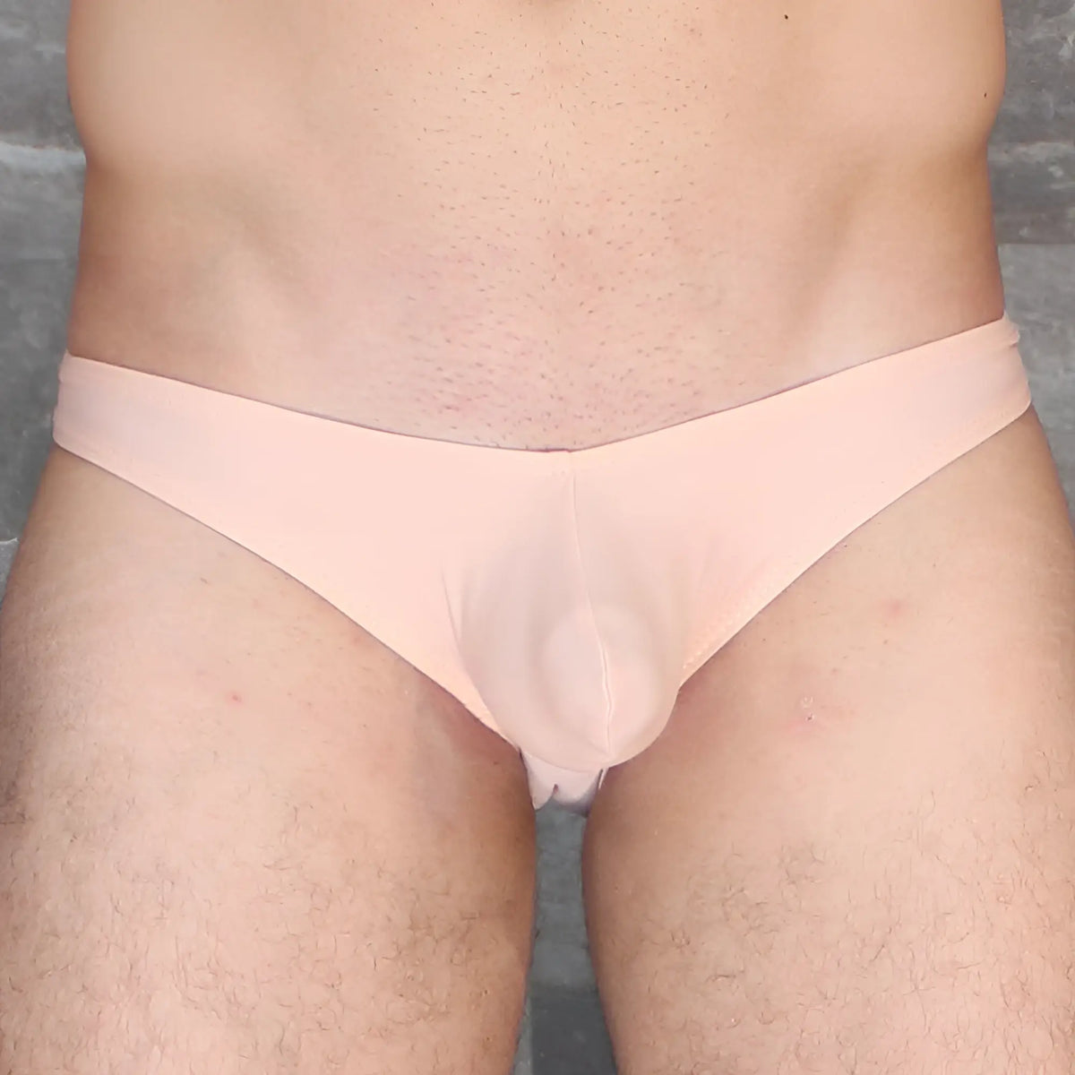 Mckillop VKDS TA2 hoist bikini naked pale pink sheer thong with smooth form fitting design shown from the back