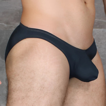 Black form-fitting Mckillop VKDS TA2 Hoist bikini naked swim trunks with supportive pouch design
