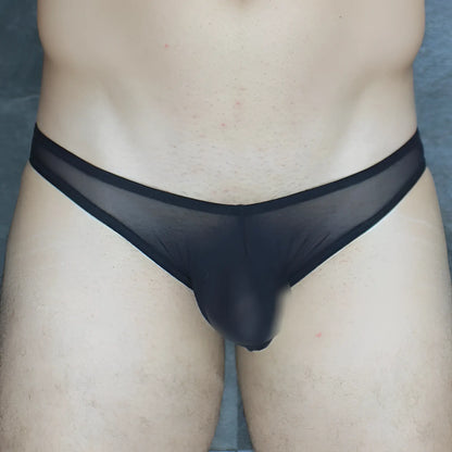 Black sheer mesh briefs with a solid black waistband from Mckillop VKUS hoist bikini ultra mesh collection