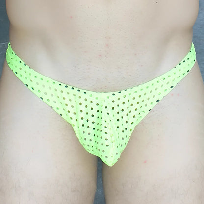Neon green mesh thong with black polka dots in mckillop vthq hoist thong glory lycra fabric visible from front view
