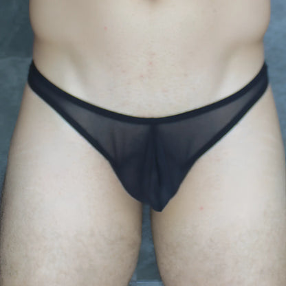 Black sheer mesh thong with solid black waistband shown from the back in mckillop vtus hoist thong ultra mesh design