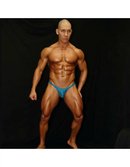 Calypso blue micro bikini underwear by Arroyman featuring a minimal design and a snug fit modeled by a muscular man.