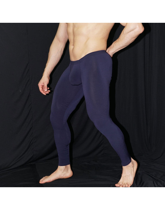 Navy blue form-fitting Arroyman bulge runner tights rnR006s men’s sculpted performance leggings shown from the back