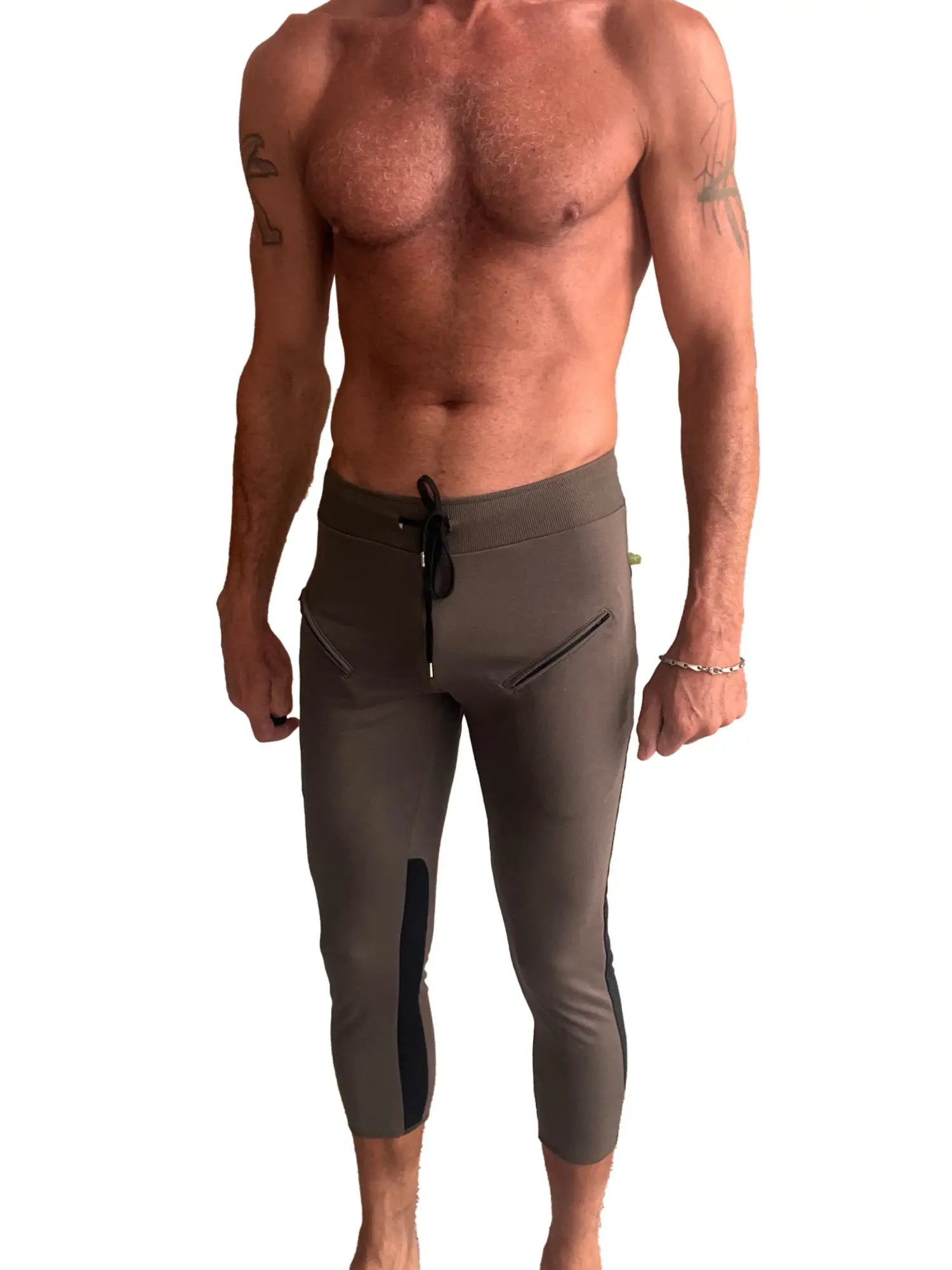 Mens olive green athletic capri yoga pants with black side panels and drawstring waistband for active wear