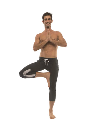 Mens 4/5 zipper pocket capri yoga pants in black with white side stripes and matching drawstring waistband