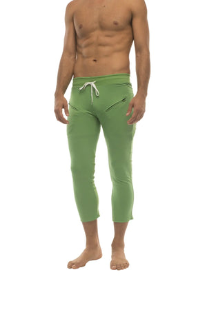 Mens 4/5 zipper pocket capri yoga pants in solid bamboo green with white drawstring waistband and side pockets