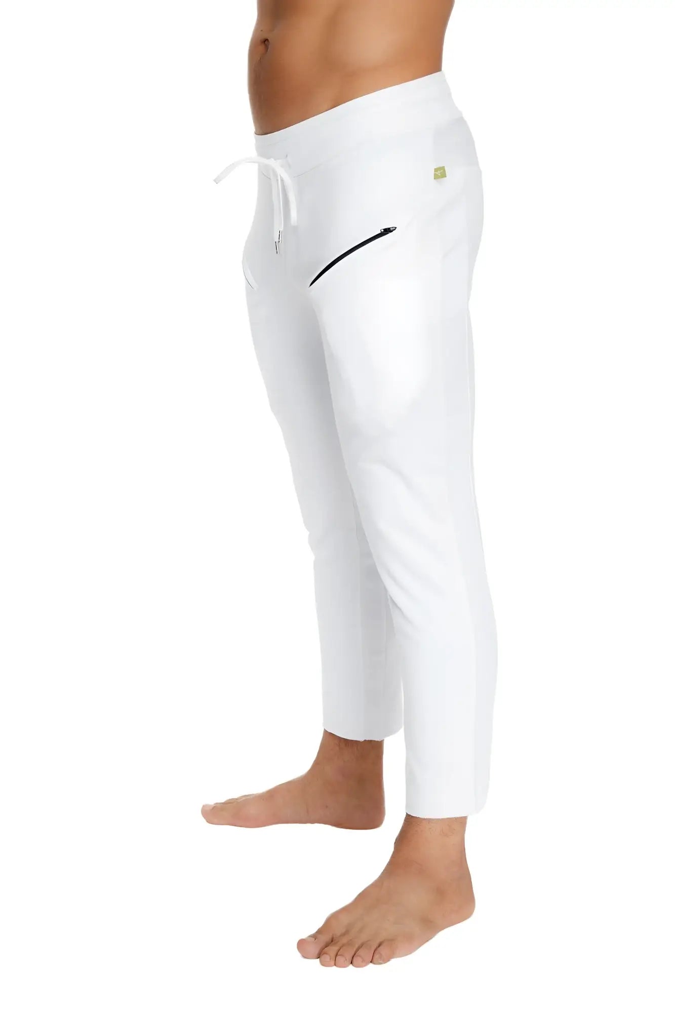 Mens white athletic joggers with a drawstring waistband and black zipper side pocket for yoga and casual wear