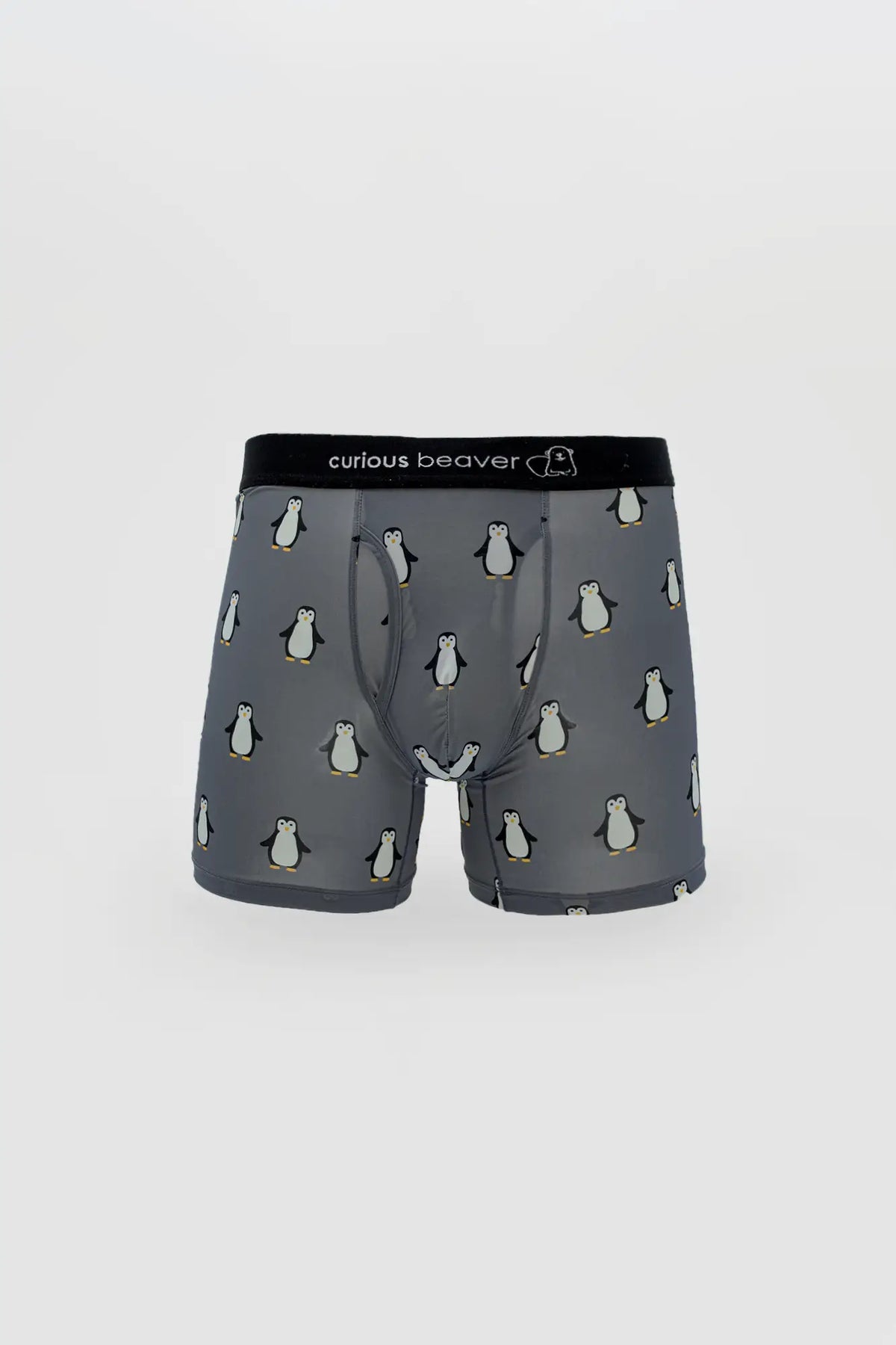 Menâ€™s gray boxer briefs with cartoon penguin pattern and black curious beaver branded elastic waistband