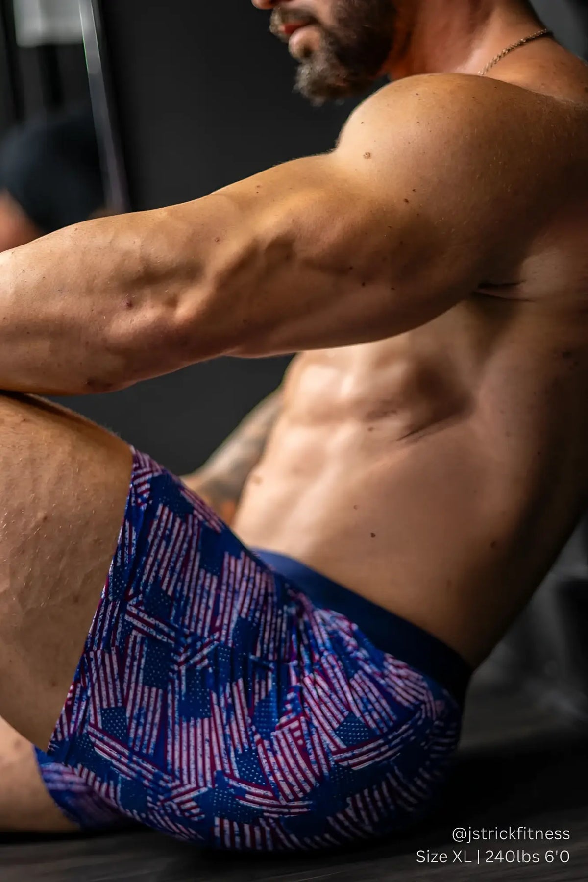 Menâ€™s boxer briefs featuring a blue and red geometric american flag pattern designed for athletic comfort